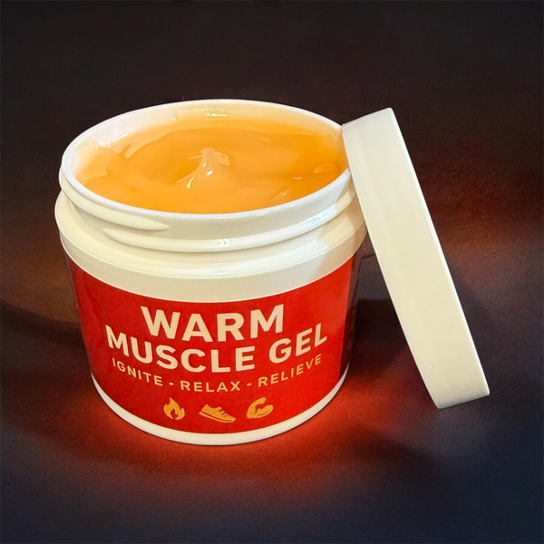 Jar of warm muscle gel with a red label on a dark background