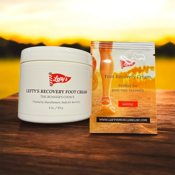 Lefty's Recovery Foot Cream jar and packaging on a wooden surface with a blurred background
